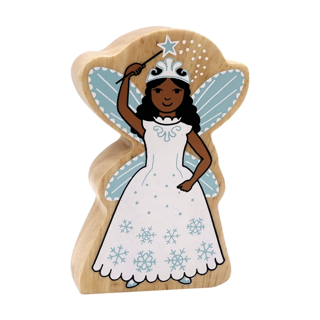 A wooden toy snow fairy in white dress with wand