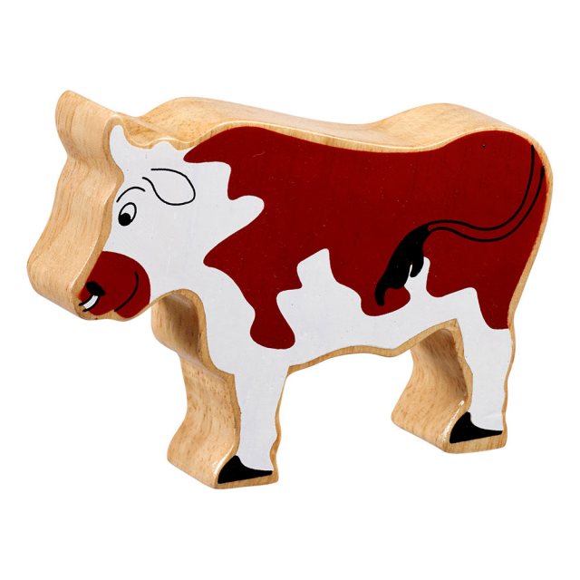 A chunky wooden brown bull toy figure in profile with a natural wood edge
