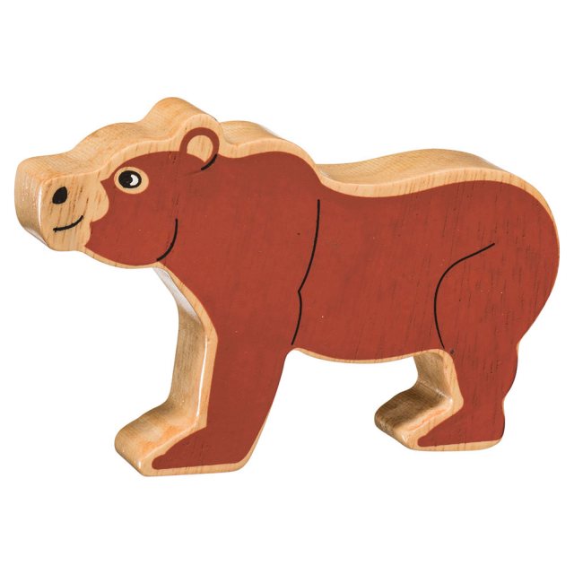 A chunky wooden painted brown bear toy figure in profile with a natural wood edge