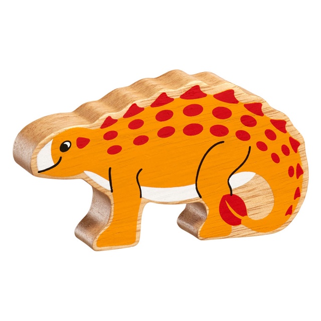 A chunky wooden yellow saichania dinosaur toy figure in profile with a natural wood edge