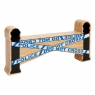 A chunky wooden black, white and blue toy police barrier with a natural wood edge