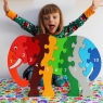 Child playing with rainbow elephant 1-10 jumbo size jigsaw puzzle