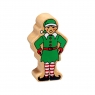 A chunky wooden green elf toy figure in profile with a natural wood edge
