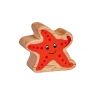 A chunky natural wood orange starfish figure in profile with a natural wood edge.