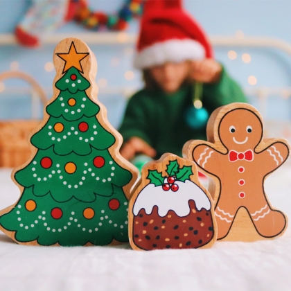 Wooden brown and white Christmas pudding toy