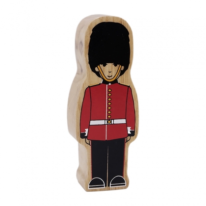 Wooden black & red guardsman toy with imperfections