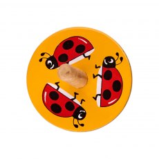 Ladybird wooden spinning top