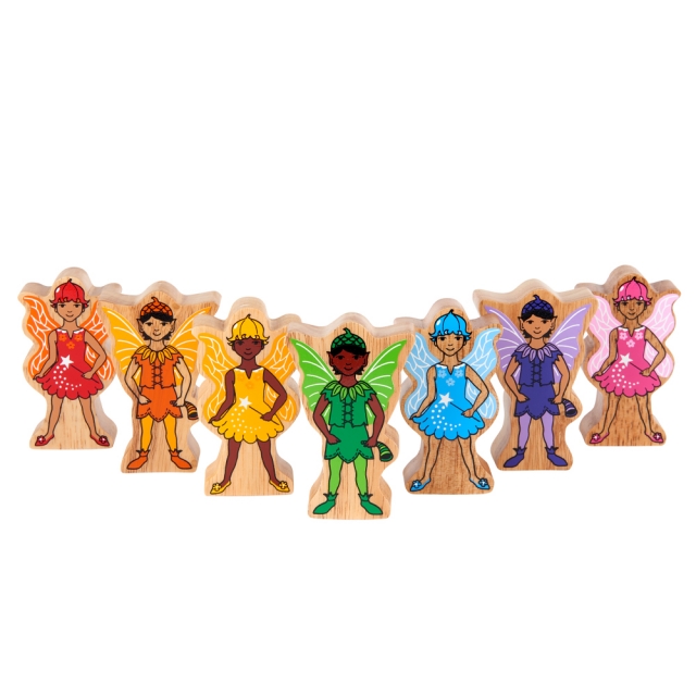 A line up of wooden toy rainbow fairy characters in profile