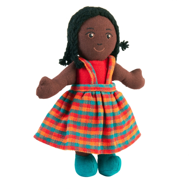 Soft toy boy rag doll with black skin, black braided hair wearing multicoloured dress