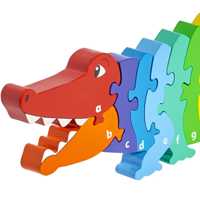 Twenty six piece chunky wooden rainbow crocodile a-z jigaw puzzle in profile free standing