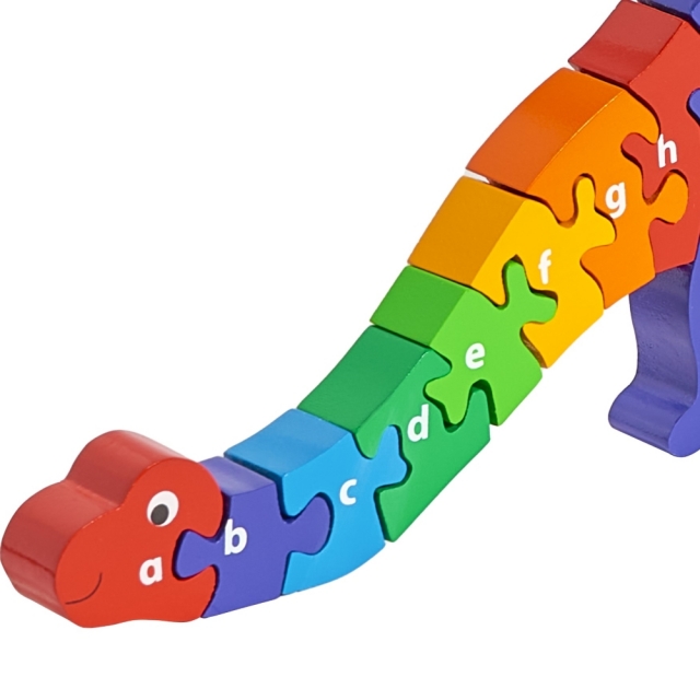 Twenty six piece chunky wooden rainbow dinosaur a-z jigsaw puzzle in profile free standing