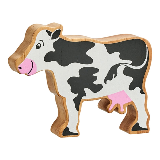 A black and white cow wooden toy for children made from natural wood