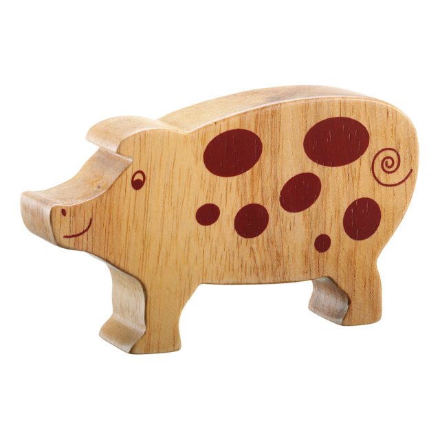 A chunky wooden pig toy figure in profile, plain with wood grain