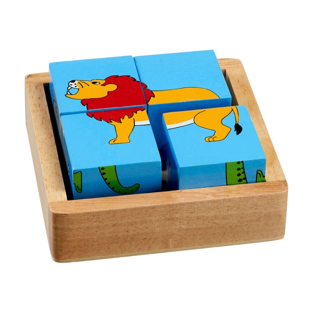 Four piece world animal block puzzle with lion design in a plain wooden tray