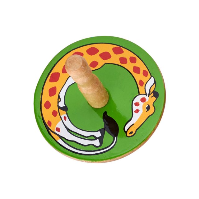a birds eye view of a green spinning top with a design of a yellow giraffe