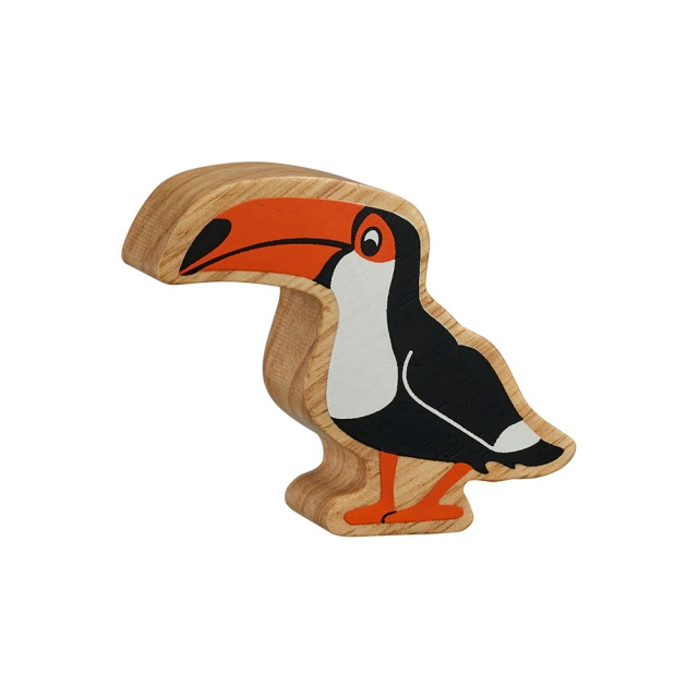 A chunky wooden black and orange toucan figure with a natural wood edge