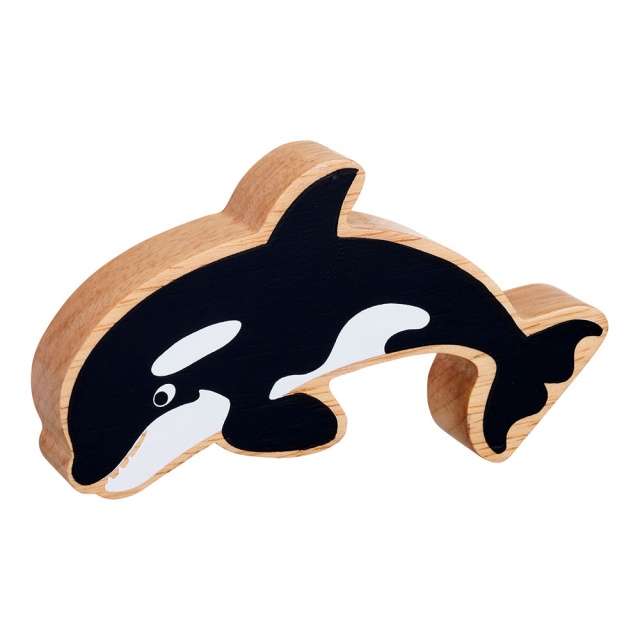 A chunky natural wood orca figure in profile with a natural wood edge