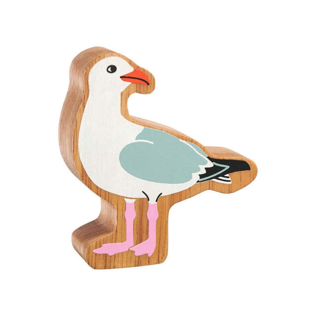 A chunky wooden seagull toy figure in profile with a natural wood edge