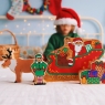 Father Christmas in a Sleigh toy with presents, elf and reindeer wooden toy characters ready to play