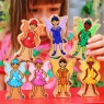 A stack of wooden toy rainbow fairy characters in profile