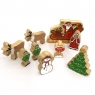 An assortment of wooden toy christmas characters in a box