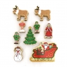 An assortment of wooden toy christmas characters on a white background