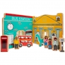 A quarter of the Town toy world showing the front of a Bus Station and Museum with characters