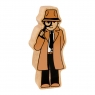 A chunky wooden brown detective wooden toy figure with a natural wood edge