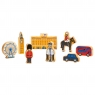 A mini London toy playset pictured in situ including iconic London vehilces, buildings and people
