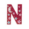 Sparkly pink wooden letter N with colourful Night design hand screen printed on the front