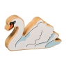 A wooden toy white swan in profile with a natural wood grain edge