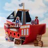 Red wooden pirate ship against a cloud background in situ with pirate walking the plank