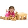 Child playing with natural wood barn, farm animals, people, walls, fences and gates