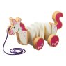 White and pink wooden unicorn pull along toy with four wheels and purple string
