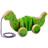 Green and purple wooden dinosaur pull along toy with four wheels and purple string