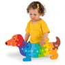 Child playing with rainbow dog 1-10 jumbo size jigsaw puzzle which is freestanding