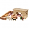 Natural wood smaller barn building with colourful wooden farm animals, people and accessories