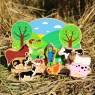 Farm set with wooden green semi circle backdrop and 9 colourful farm animals / characters