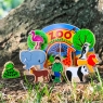 Zoo set with multicoloured animals and backdrop