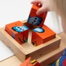 Child playing with Lanka Kade minibeast block puzzle