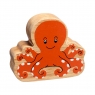 A chunky wooden orange octopus toy figure with a natural wood edge