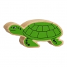 A chunky wooden green turtle toy figure with a natural wood edge