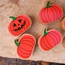 A chunky wooden orange toy pumpkin